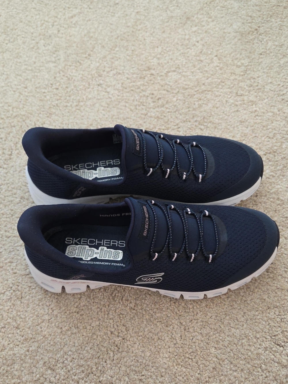 Skechers Women's Navy Slip-On Athletic Sneakers with White Sole
